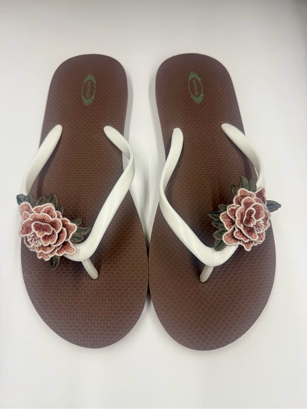 Joyfolie woman’sFloral Embroidered Flip Flop Sandals – White Straps
